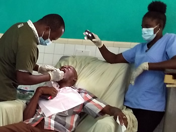 Dentist with patient